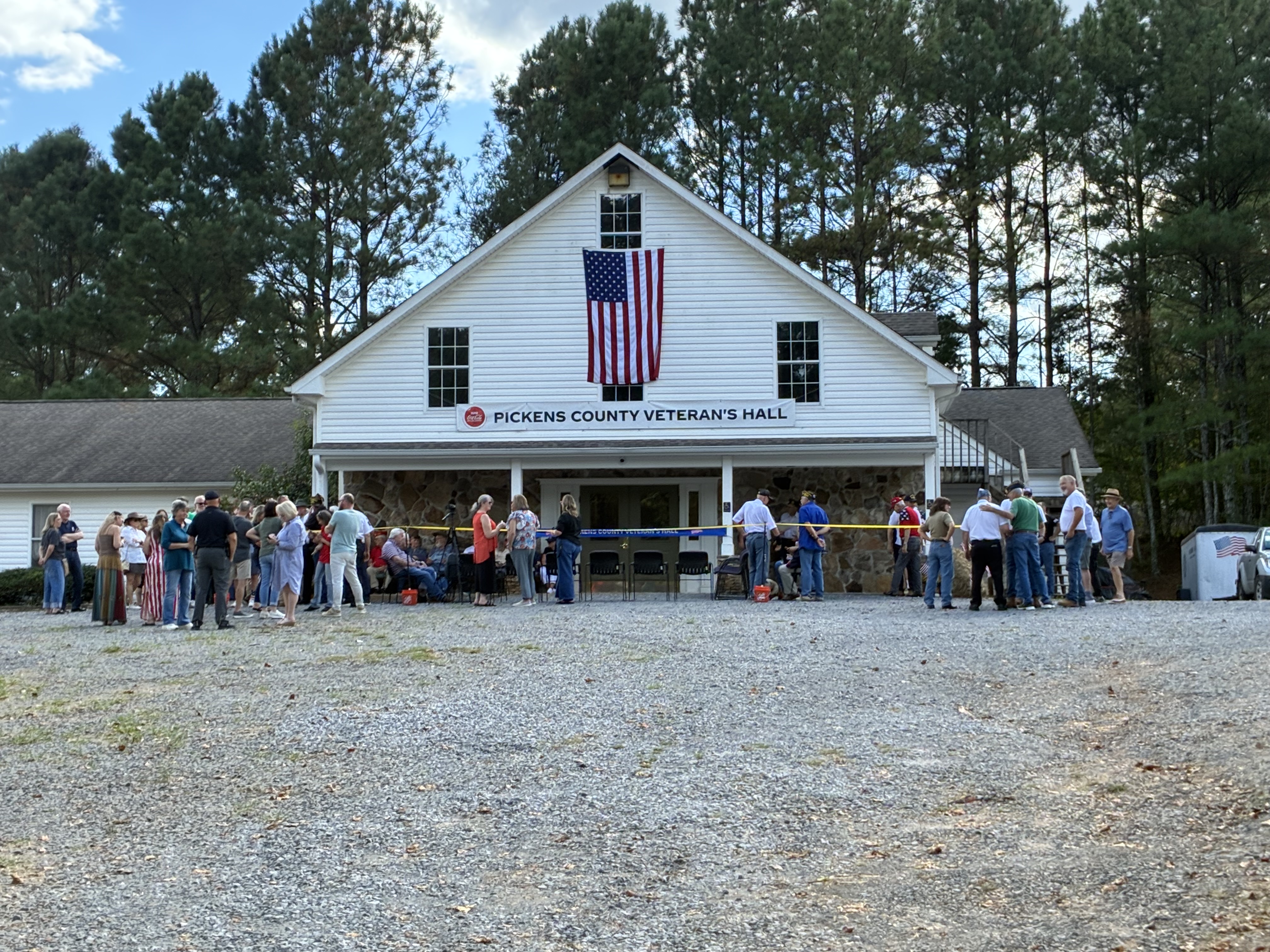 Community members gather outside Pickens County Veterans Hall.